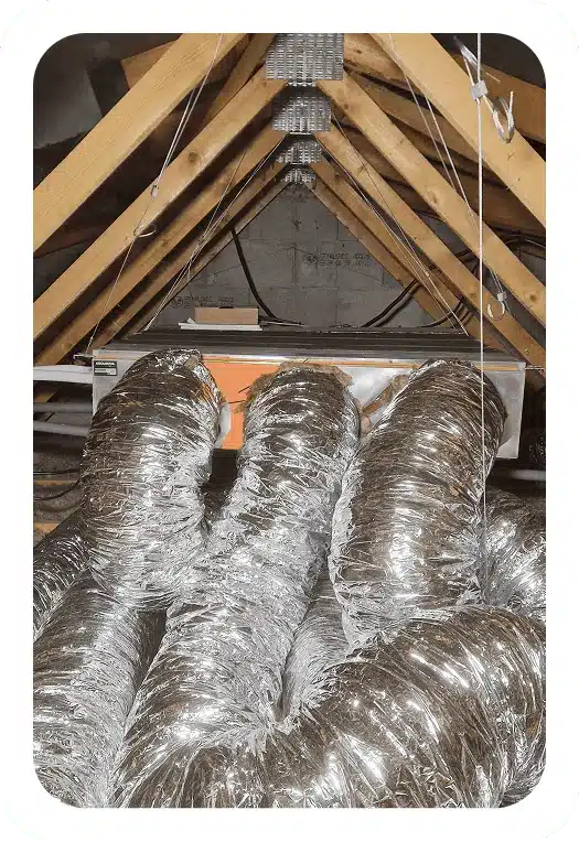 installation d'une climatisation gainable Koolnova dans les combles d'une maison à Caluire-et-Cuire en juin 2026