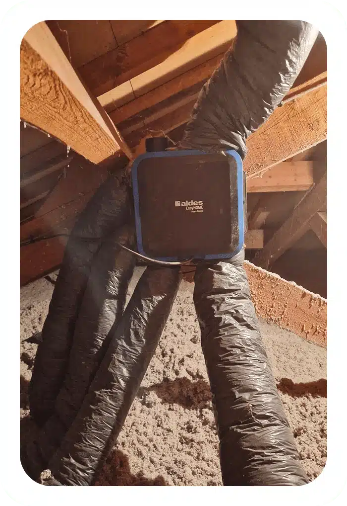 installation d'une VMC dans les combles d'une maison à Saint-Priest en juillet 2026